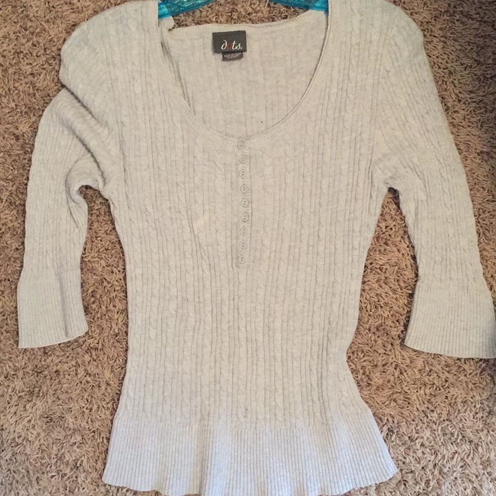 V-neck, curvy sweater.